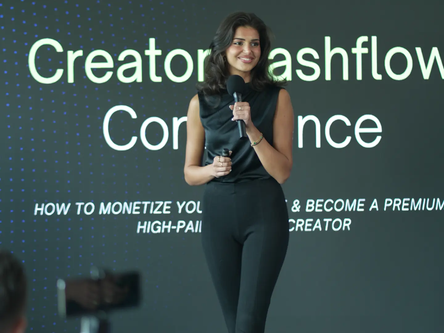 In Person and Virtual Event Space - Speaker on stage
