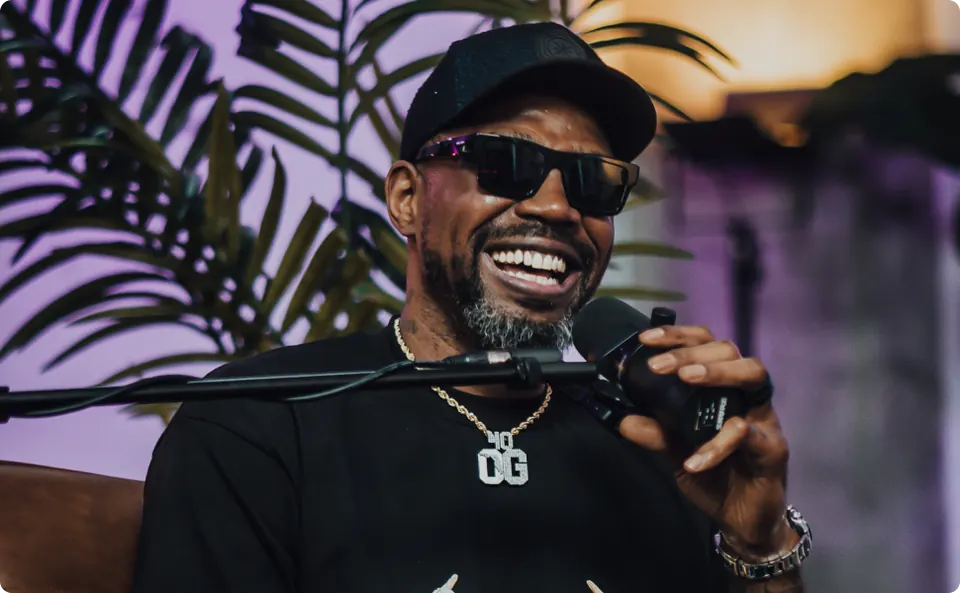 Studio A - Guest with sunglasses smiling