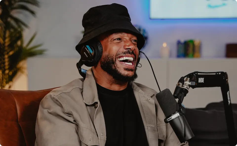 Studio A - Guest with bucket hat recording